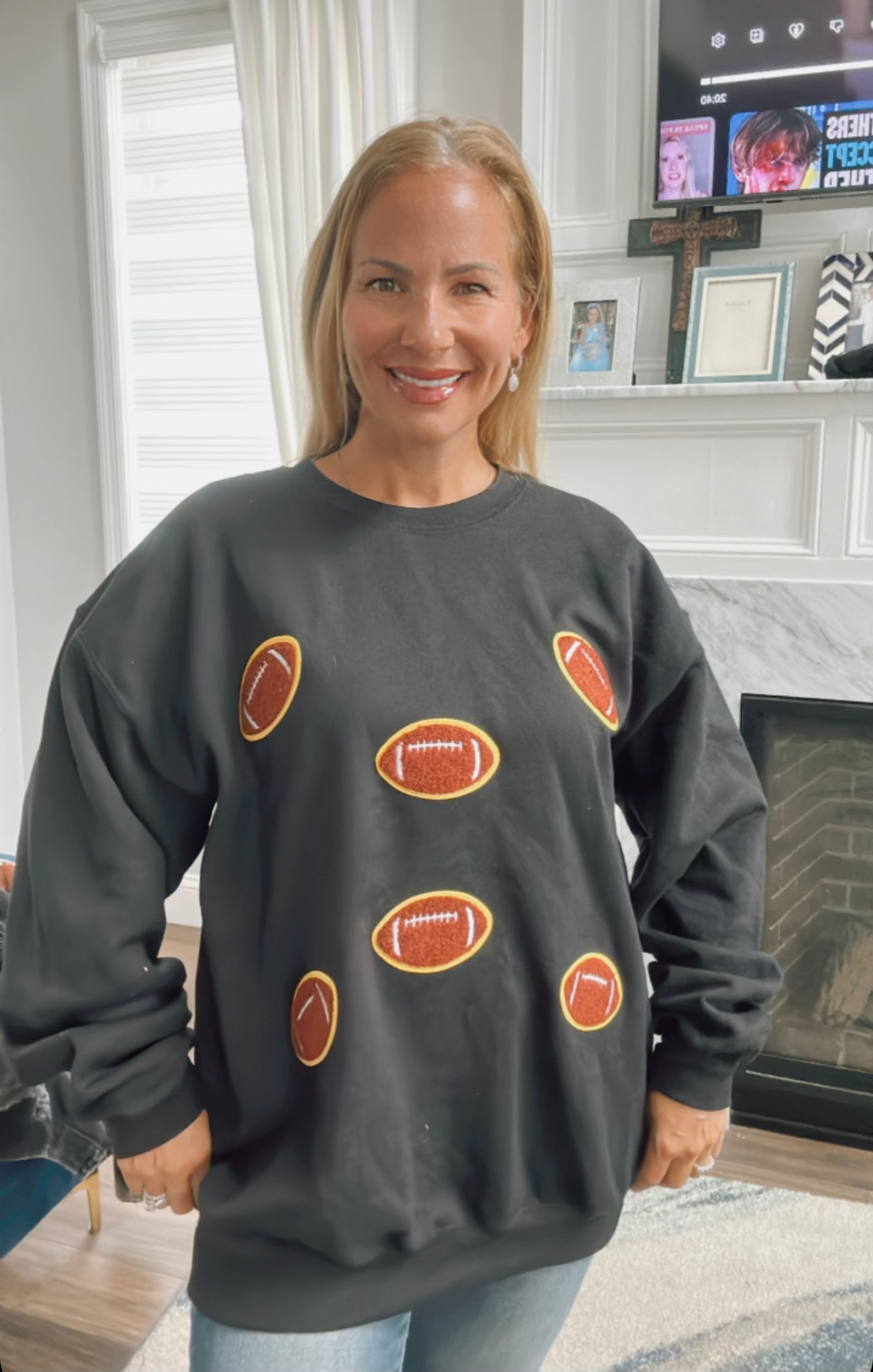 Sweatshirt with football patches