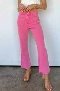 Pink ankle length flare jeans with raw hem