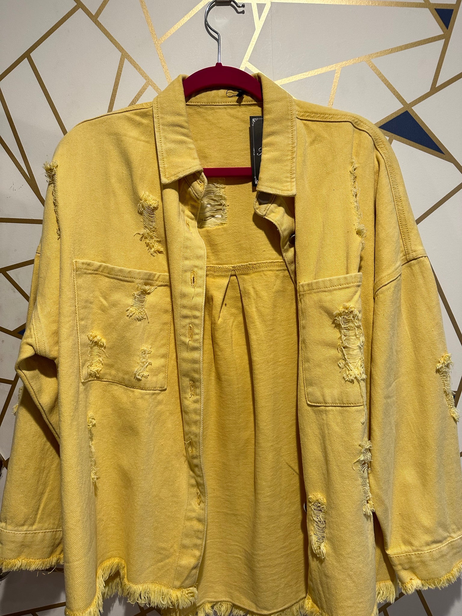 Yellow distressed denim jacket